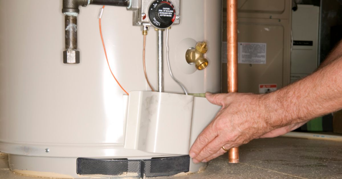 water heater leaks from top